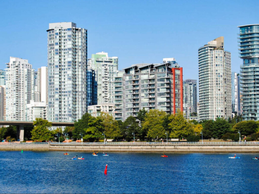 View of the cityscape and the kayakers on the False Creek