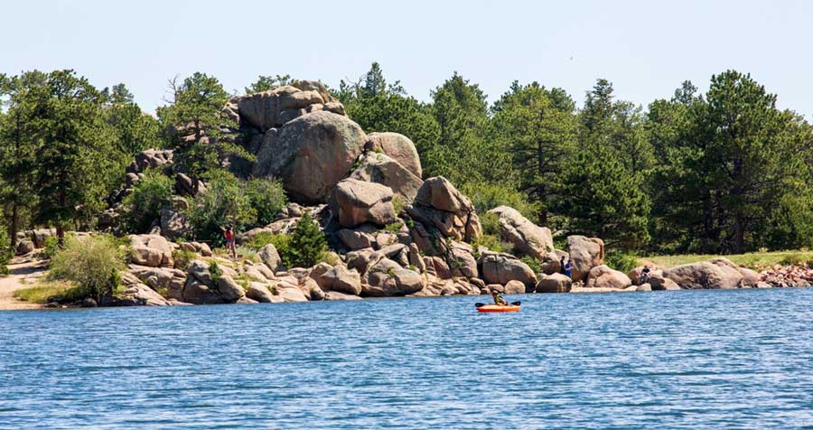 View of man kayaking in Red Feather Lakes