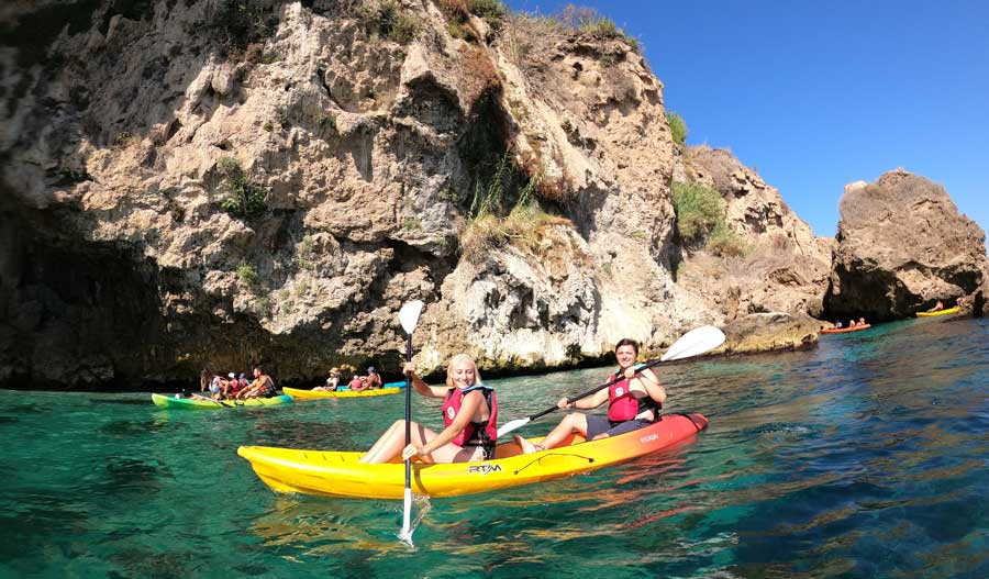 The author with her friend kayaking in Spain