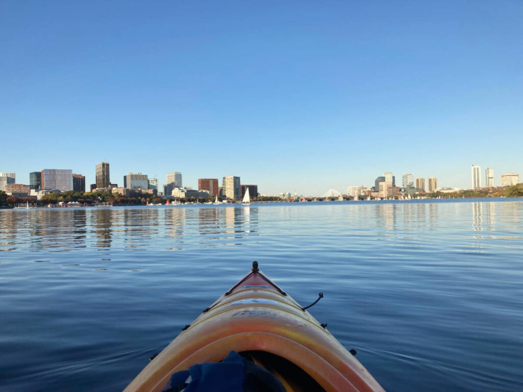 City skyline view from the kayak on Charles River