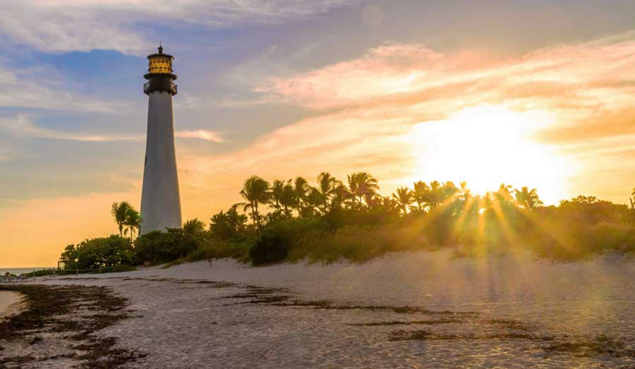 View of the Cape Florida Lighthouse during sunset in Key Biscayne