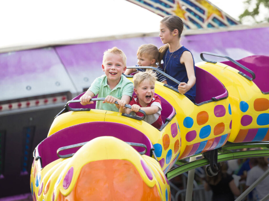 View of the kids on a roller coaster ride