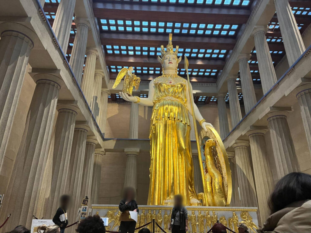 View of the golden statue inside the Kidsville at the Parthenon Story Time