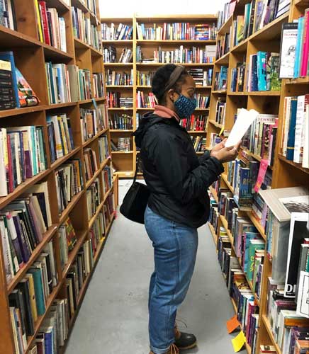 The author reading a book in King's Books