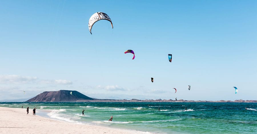 View of the kite surfers having fun on the beach