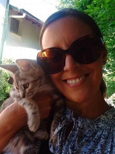 Author Catherine Driver snuggling one of the kitties in Istanbul