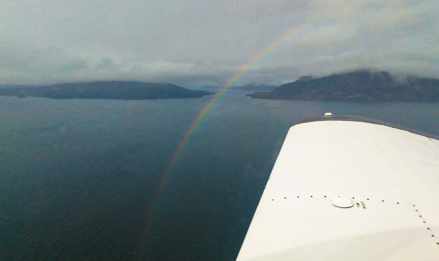 View of a rainbow over the Kodiak National Wildlife Refuge from the plane