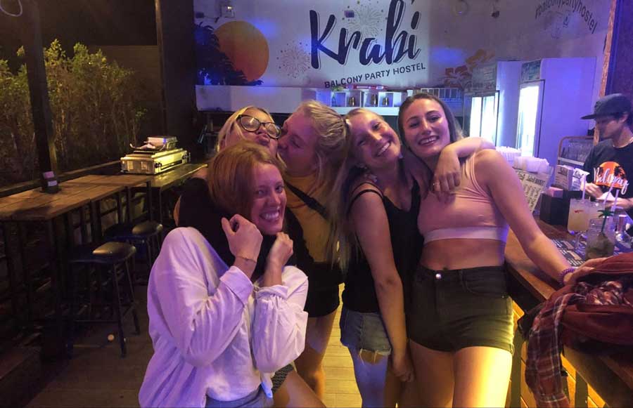 The author with her new friends on a Krabi Balcony Party Hostel