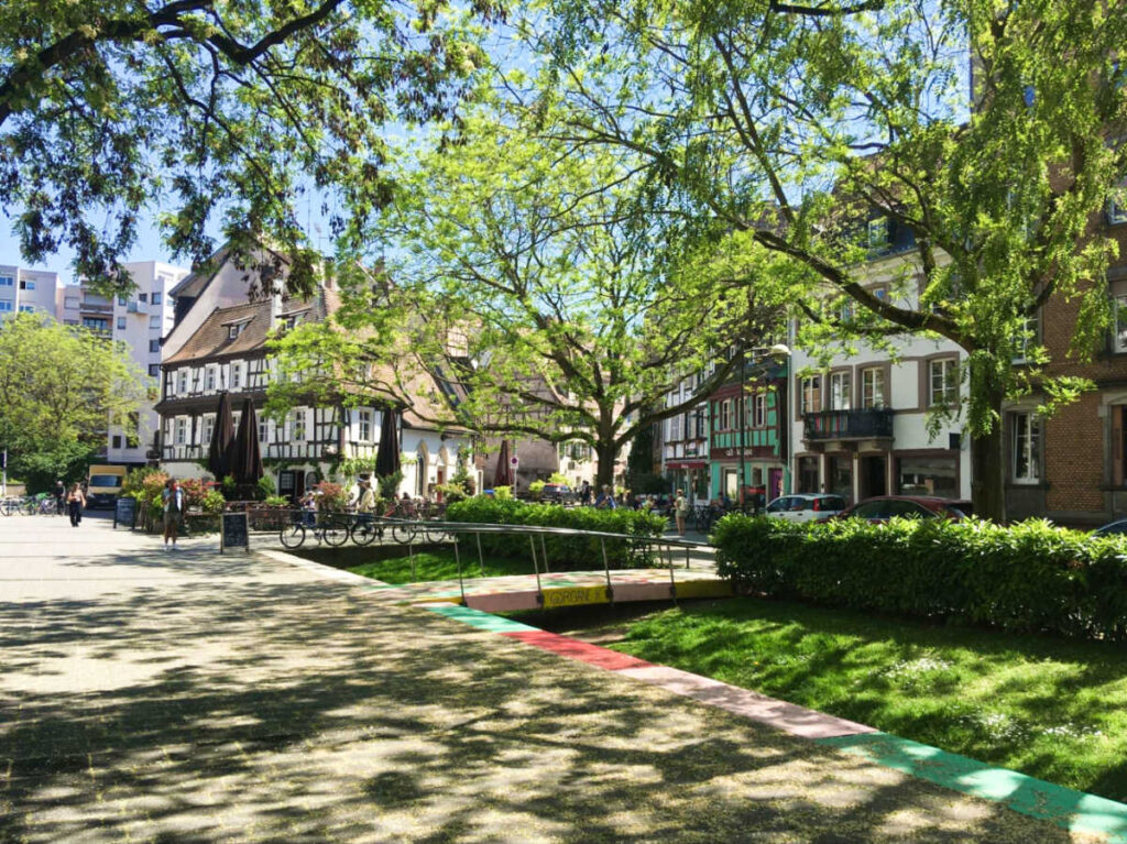 View of the buildings and the greenery at the street corner in La Bourse neighborhood