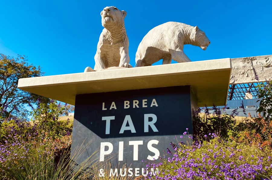 An animal sculpture on the sign of La Brea Tar Pits