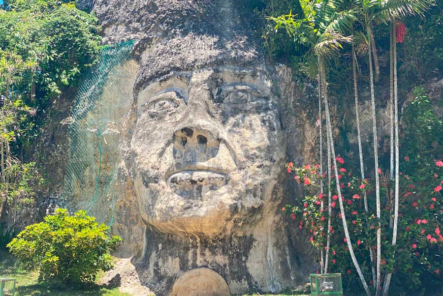 Taino Indian face carved on a rock in La Cara del Indio