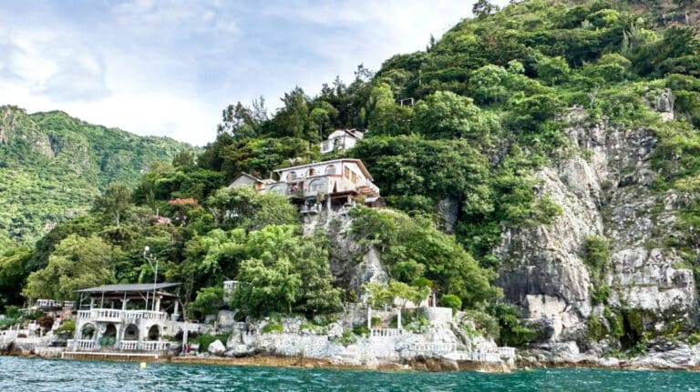 Exterior view of a hotel on the cliff of the mountain