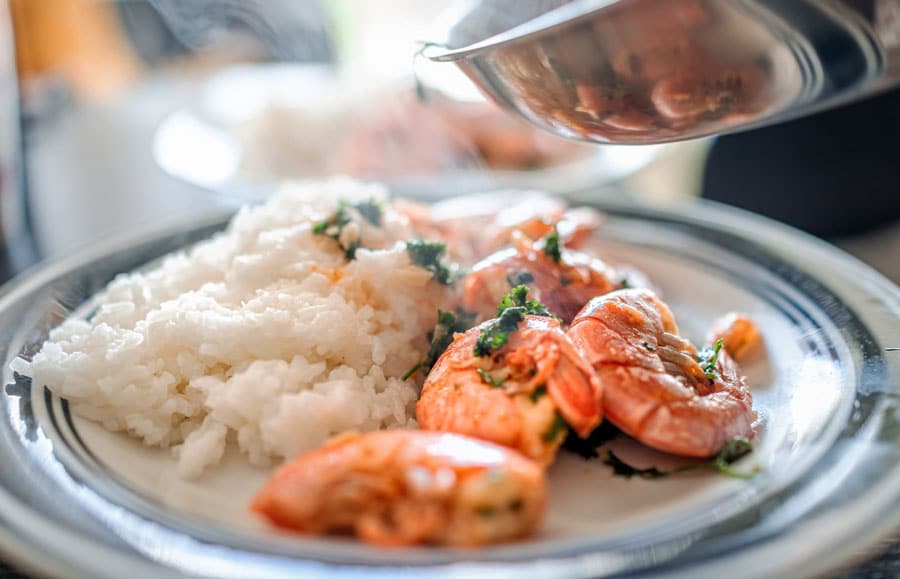 View of a rice and shrimp meal on a plate