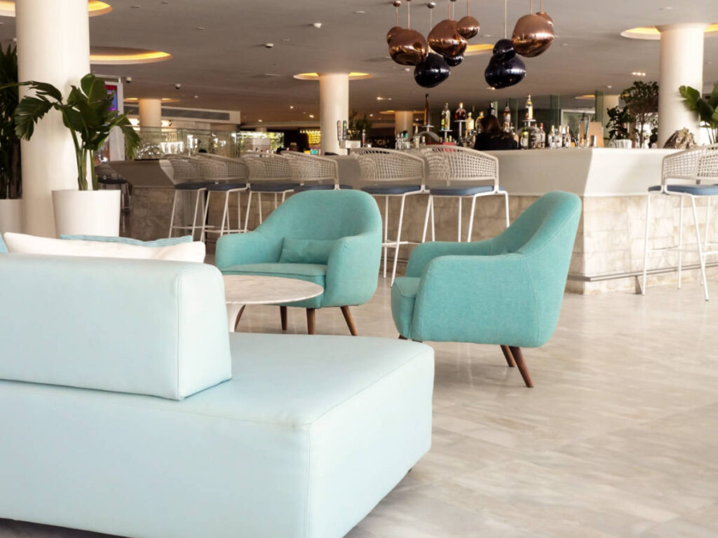 Interior view of the lounge and bar area of La Concha Renaissance San Juan Resort