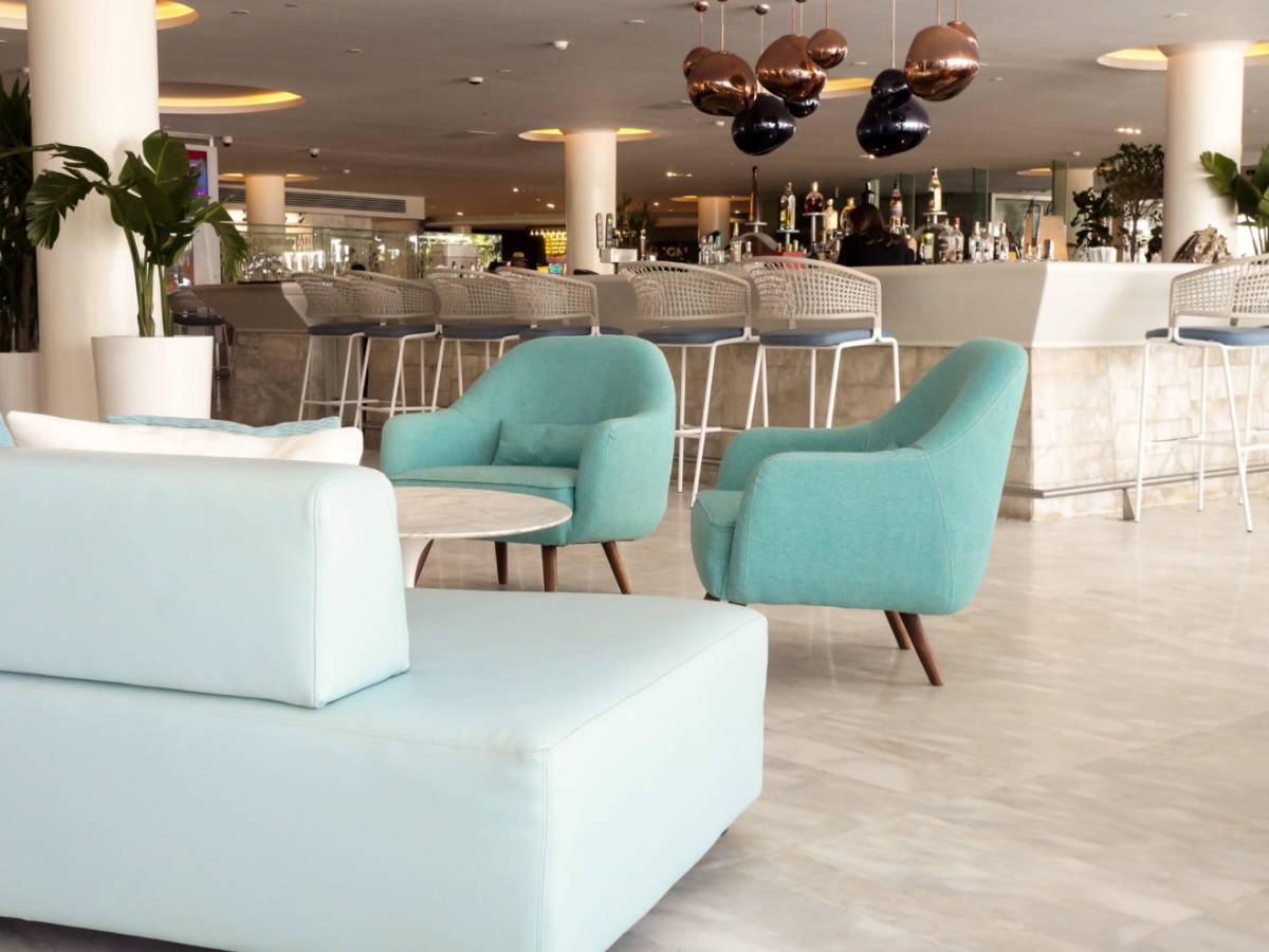 Interior view of the lounge and bar area of La Concha Renaissance San Juan Resort