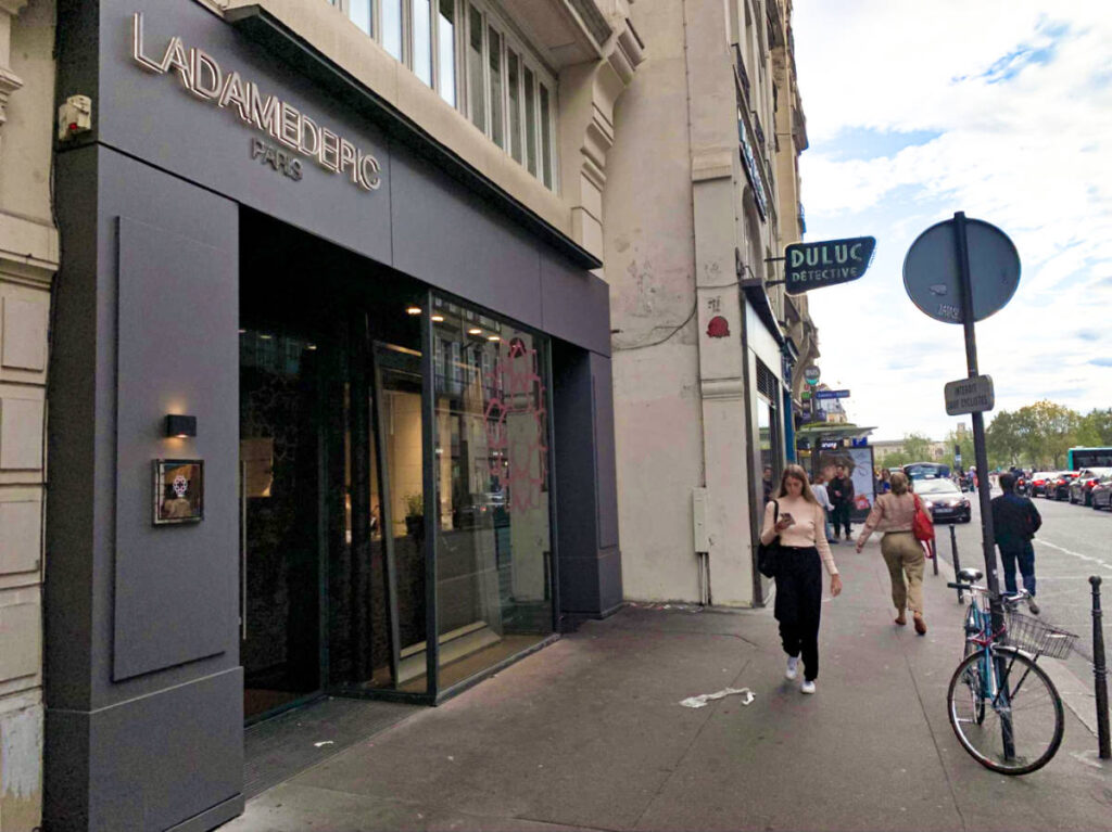 View of the minimalist exterior and entrance of La Dame de Pic