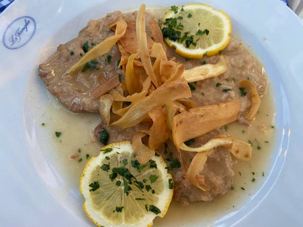 A plate of Piccatine Al Limone served at La Famiglia restaurant