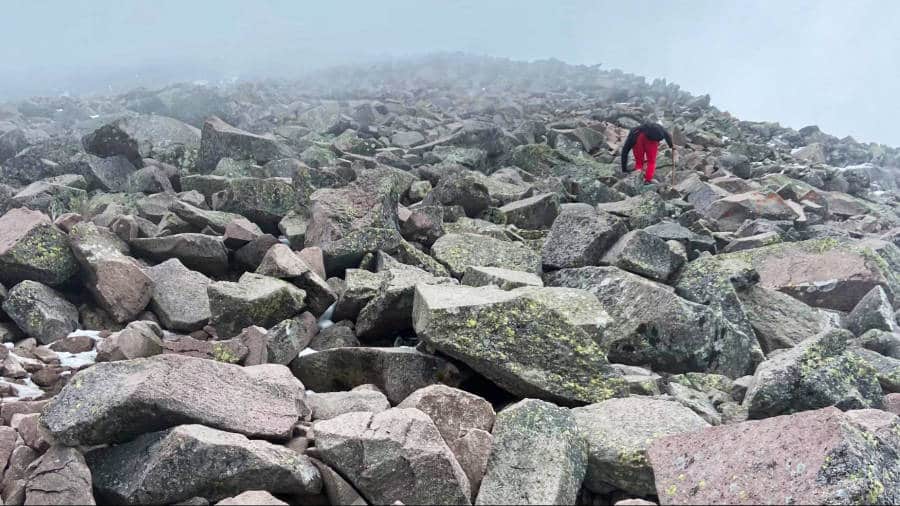 A local Mexican man going up to the rocky trail of La Malinche