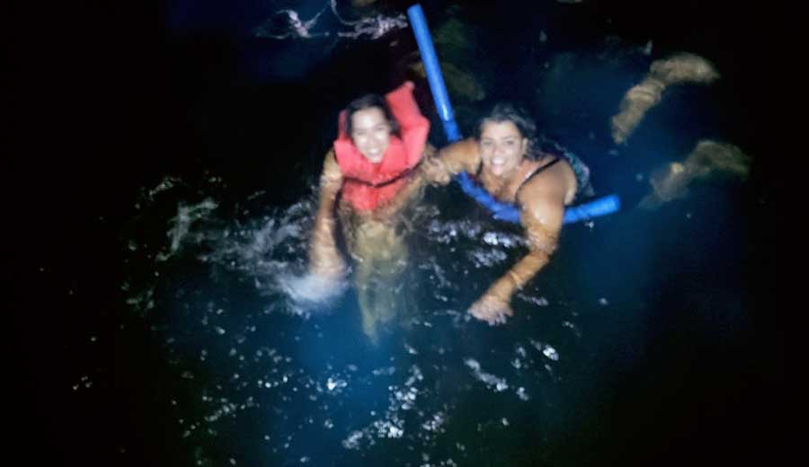 The author with her friend swimming in La Parguera Bioluminescent Bay