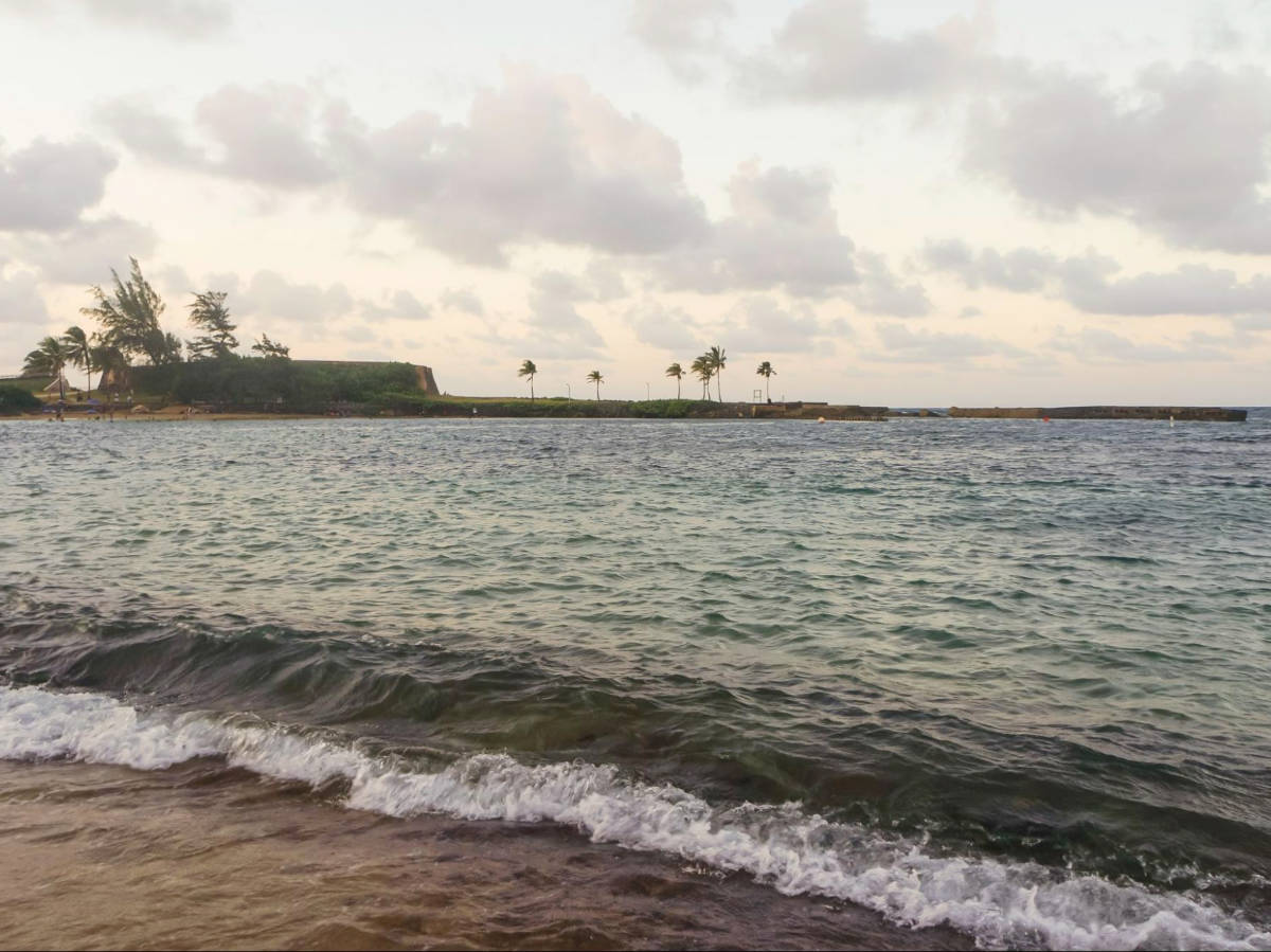 Scenic view of the island and the waves from the La Pecera