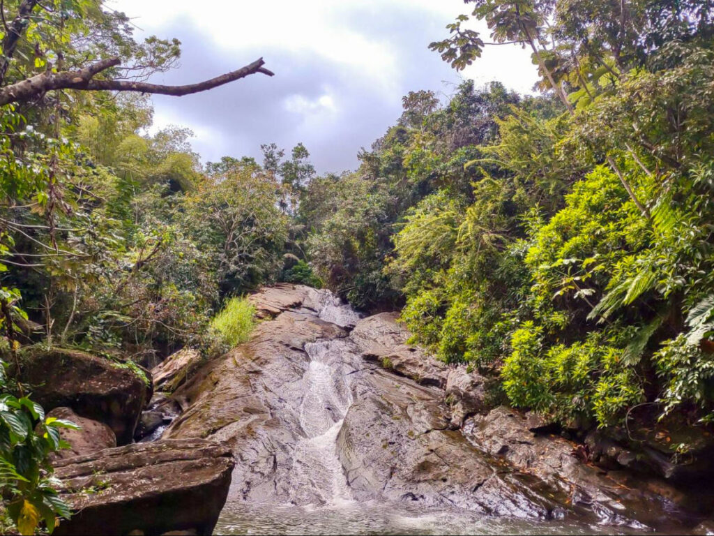 Front view of the La Soplaera waterfall in Peñuelas