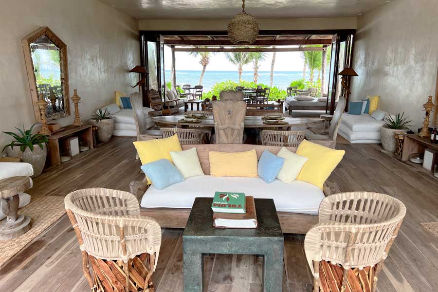 View of the lounge area with a beach view in La Valise Tulum