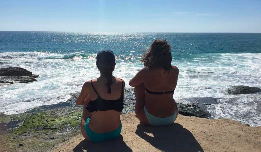 The author with her friend admiring the view from Laguna Beach