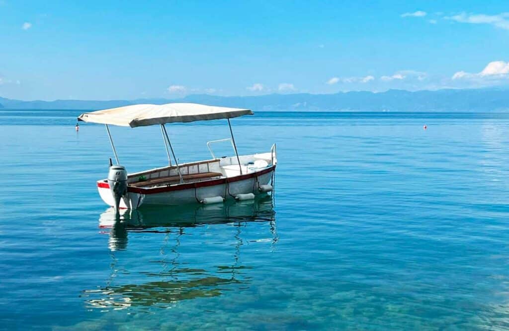 A boat floating at the water of Lake Ohrid