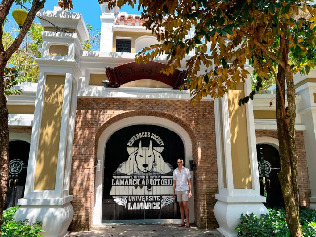 Nate in front of the Lamarck University Auditorium