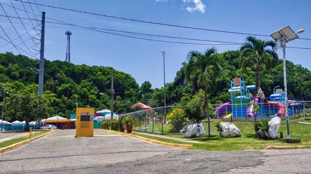 View of the colorful playground from the entrance to Las Cascadas Waterpark