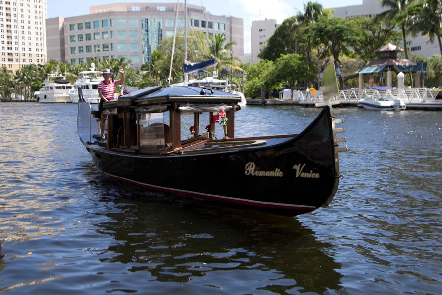 View of Las Olas Gondola owner riding a gondola