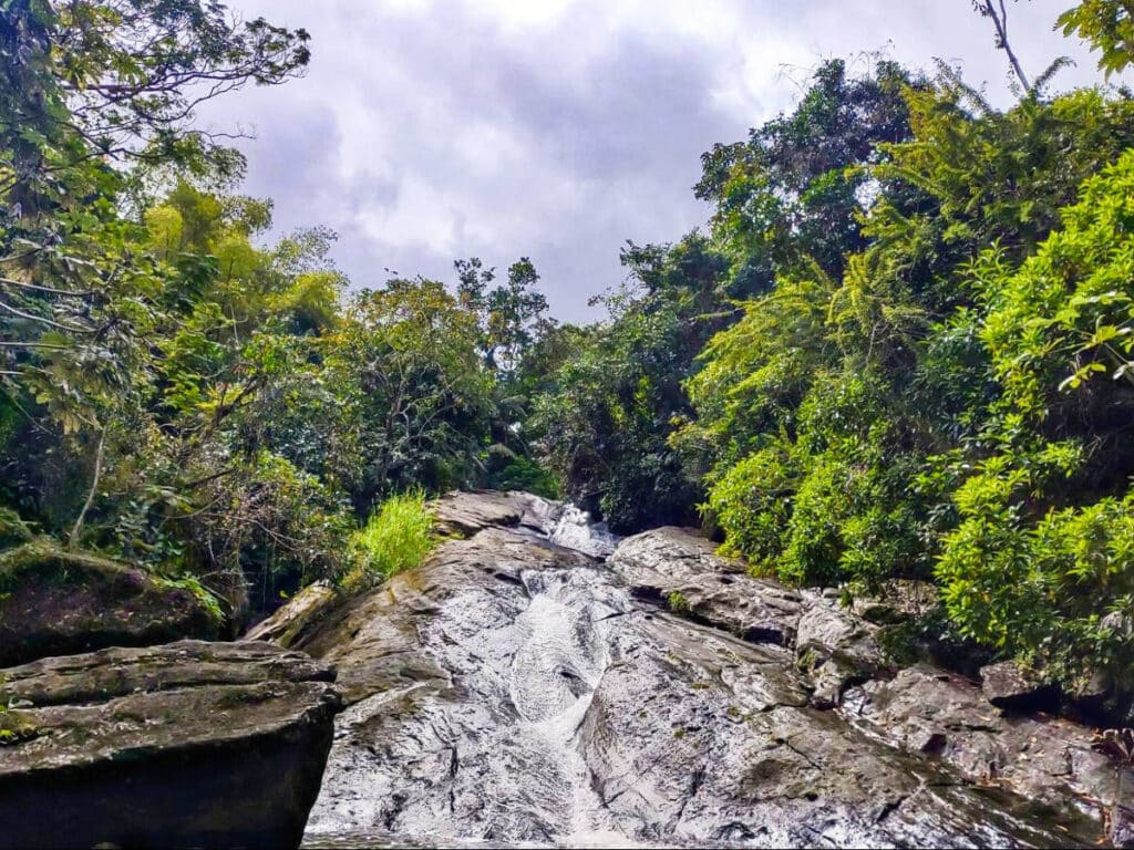 View of the water gushing down on a huge rock in Las Pailas