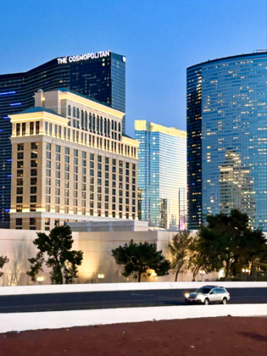 View of The Cosmopolitan Hotel and other buildings in Las Vegas at night