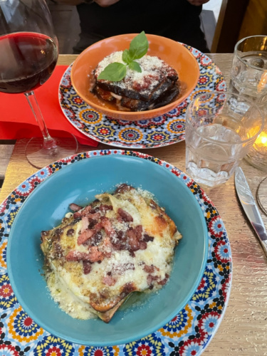 A table with two plates of lasagna from Bonta