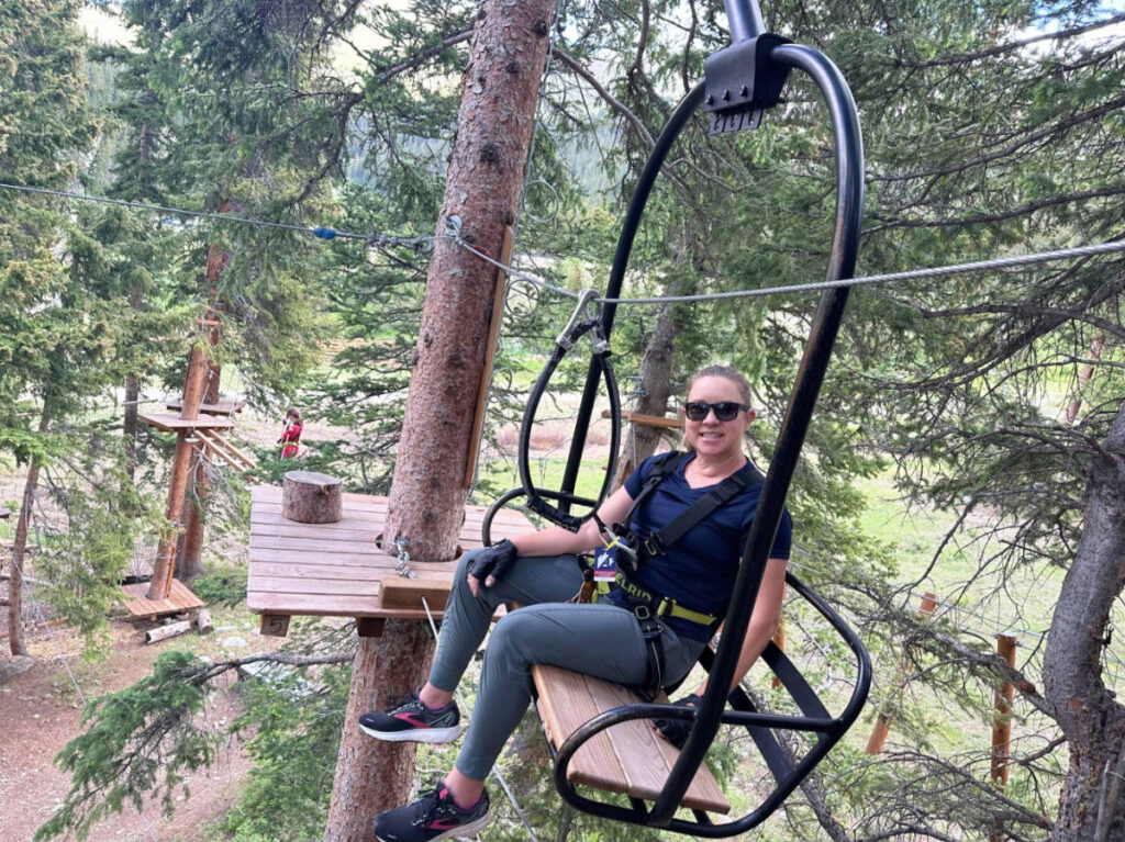 The author Laura Falin enjoying her day at the Colorado Aerial Adventure Park