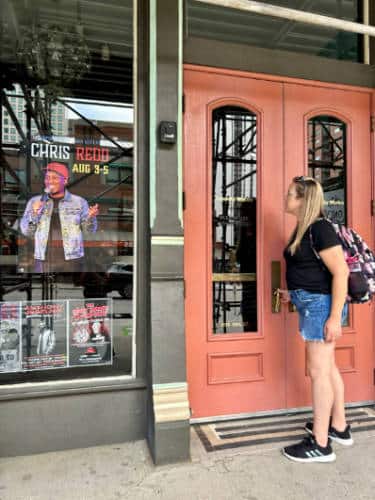 The author, Laura Falin at the entrance of Comedy Works Downtown