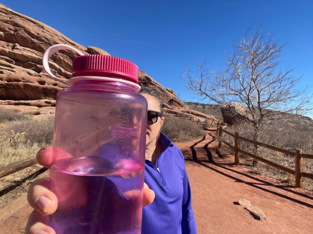 The author, Laura Falin holding a water bottle