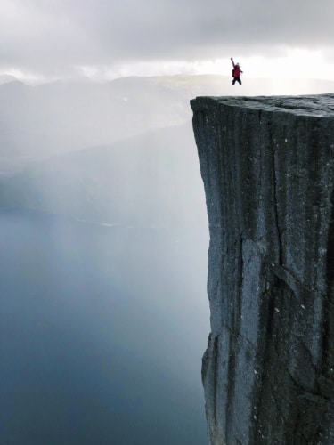Laura McFarland on top of Preikestolen in Songesand, Norway