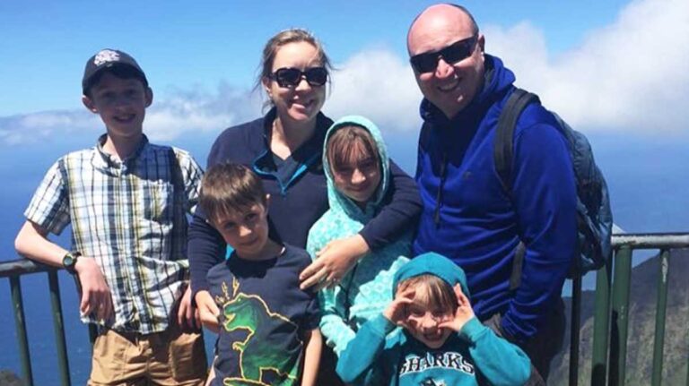 The author Laura Falin with her family smiling for a photo