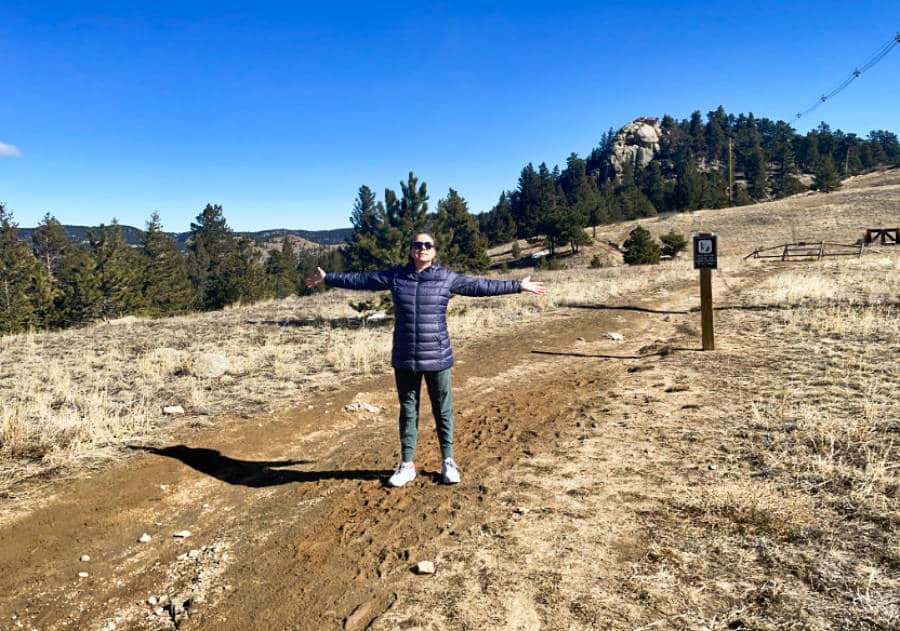 The author Laura Falin posing in the middle of Eldorado Canyon State Park