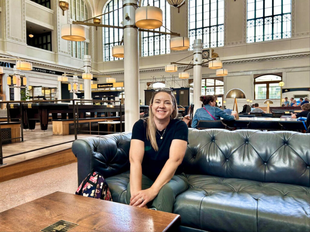 The author, Laura Falin smiling for a photo inside the Union Station