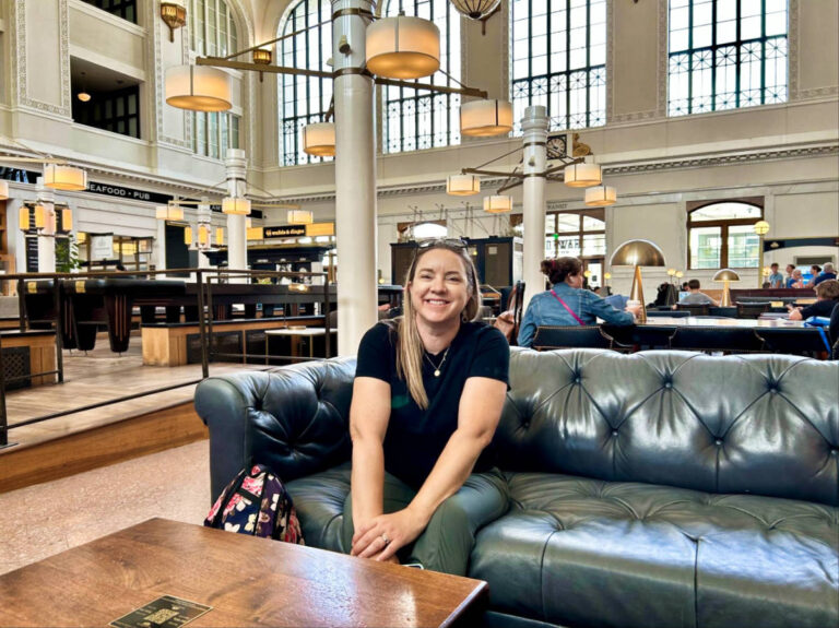 The author, Laura Falin smiling for a photo inside the Union Station