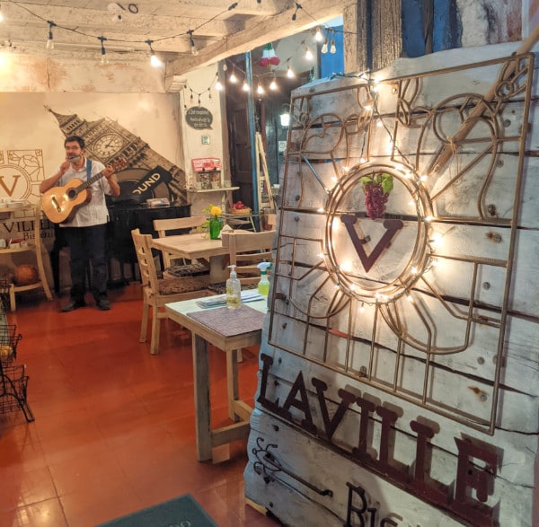 Sign and interior of Laville Bistro Cafe