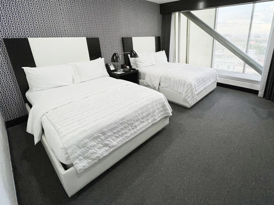 View of beds inside a room in Le Meridien