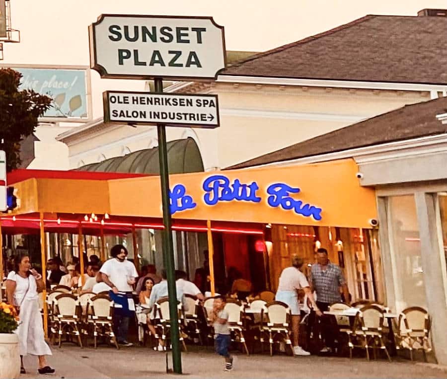 Busy outdoor dining of Le Petit Four in Sunset Boulevard