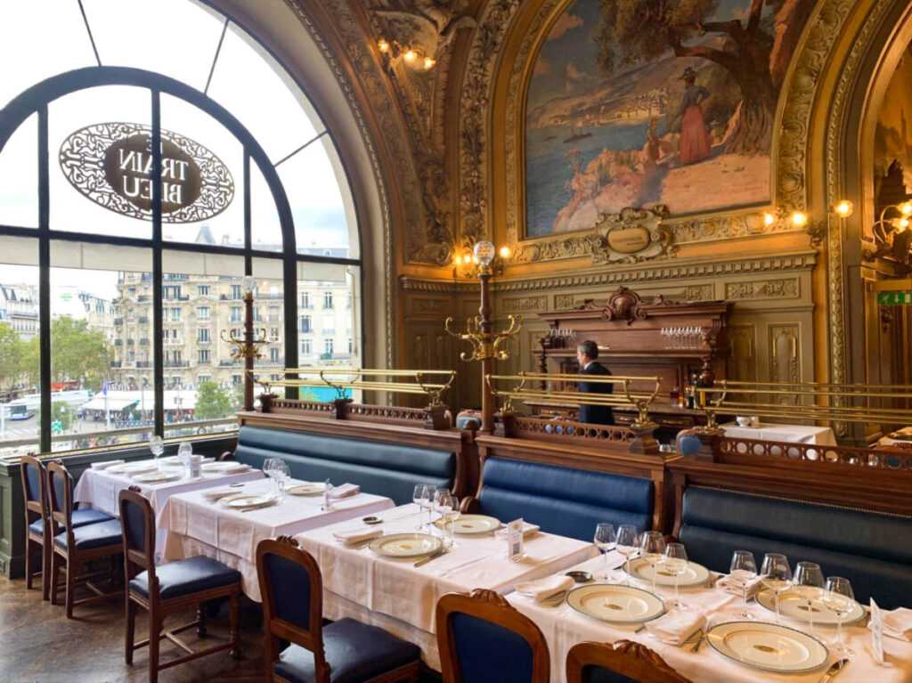 Glamorous interior of the fine dining restaurant of Le Train Bleu in Paris