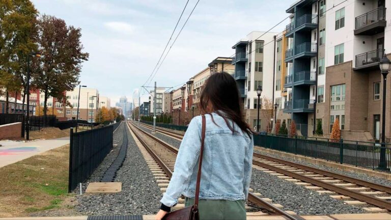 The author Lea Rose Albaugh, looking at Uptown from South End
