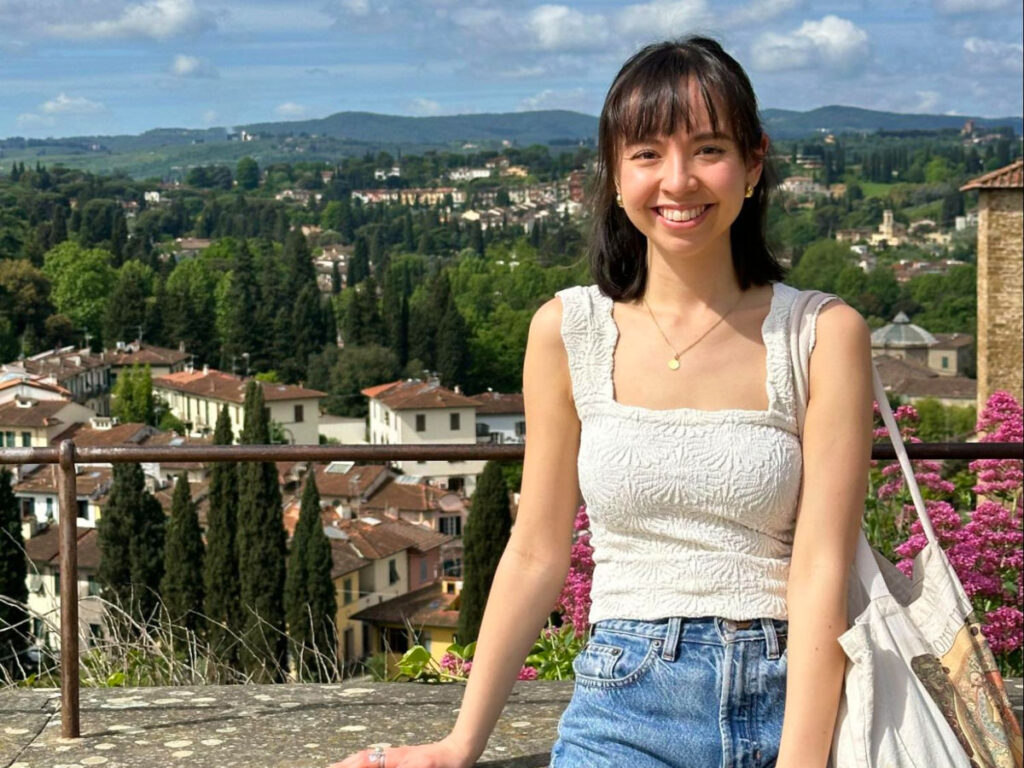 Travel Lemming Editor, Lea Rose smiling brightly at Boboli Gardens