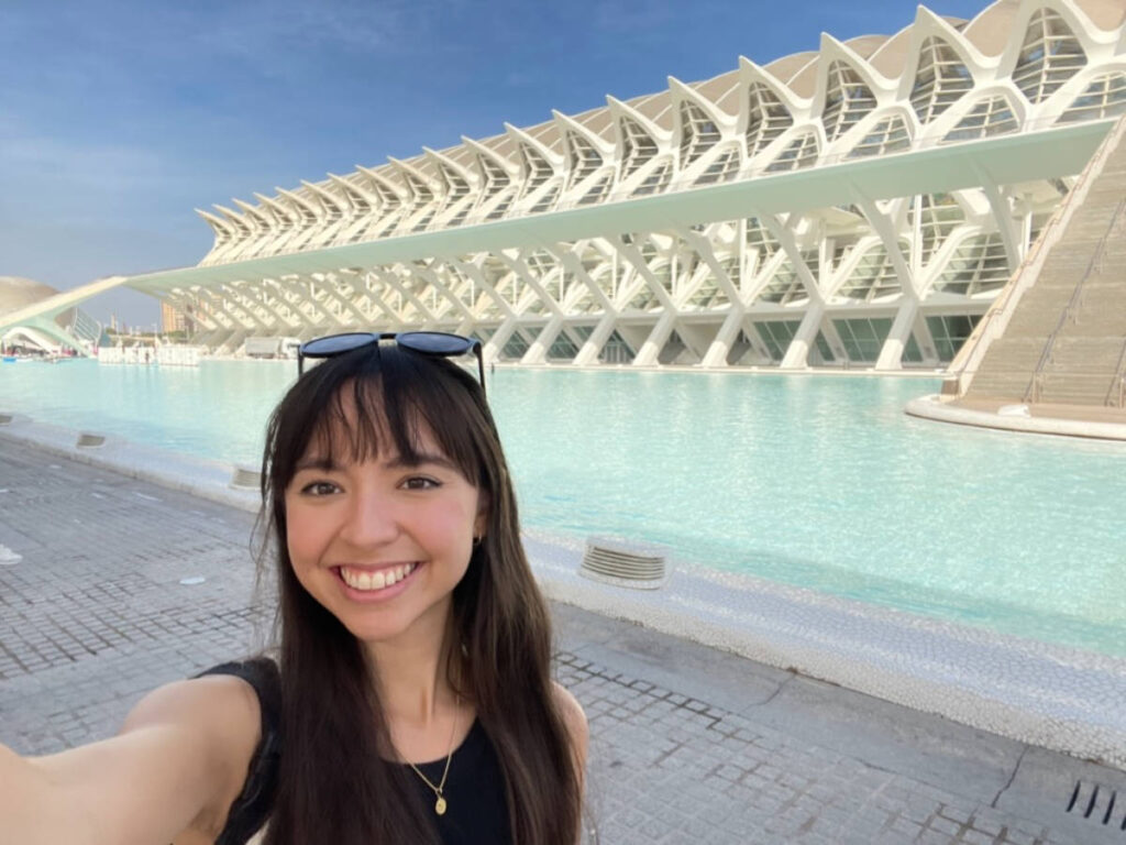 Travel Lemming Editor, Lea Rose Allbaugh, posing for a photo at the Ciudad de las Artes y las Ciencias