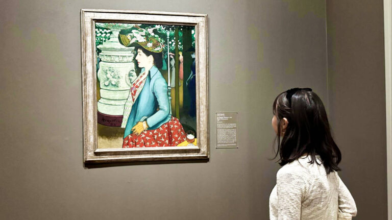 The author Lea Rose Allbaugh admiring the painting from the Impressionist Collection in The Art Institute of Chicago